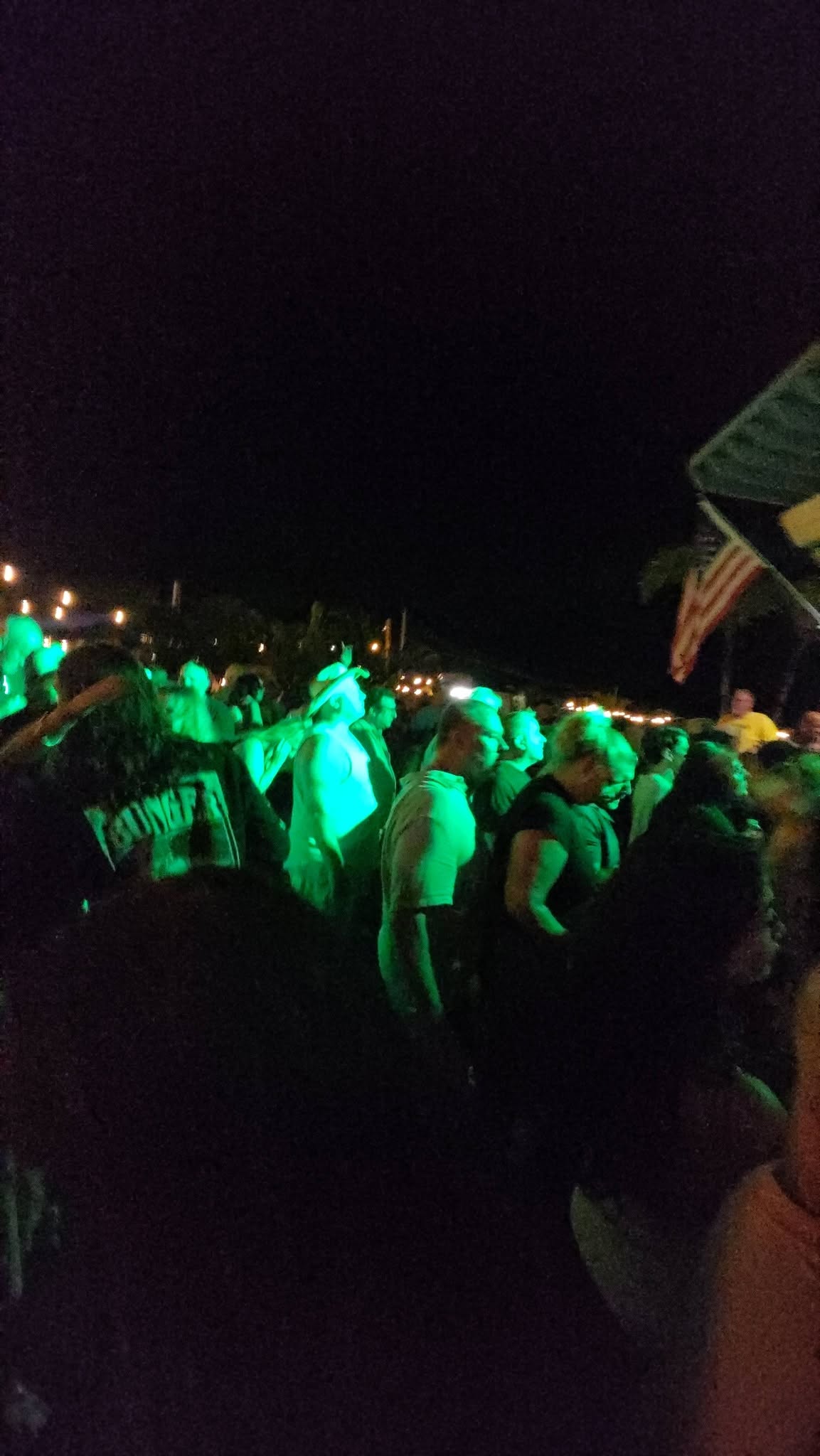 Colored lights washing over the Salt Shack crowd