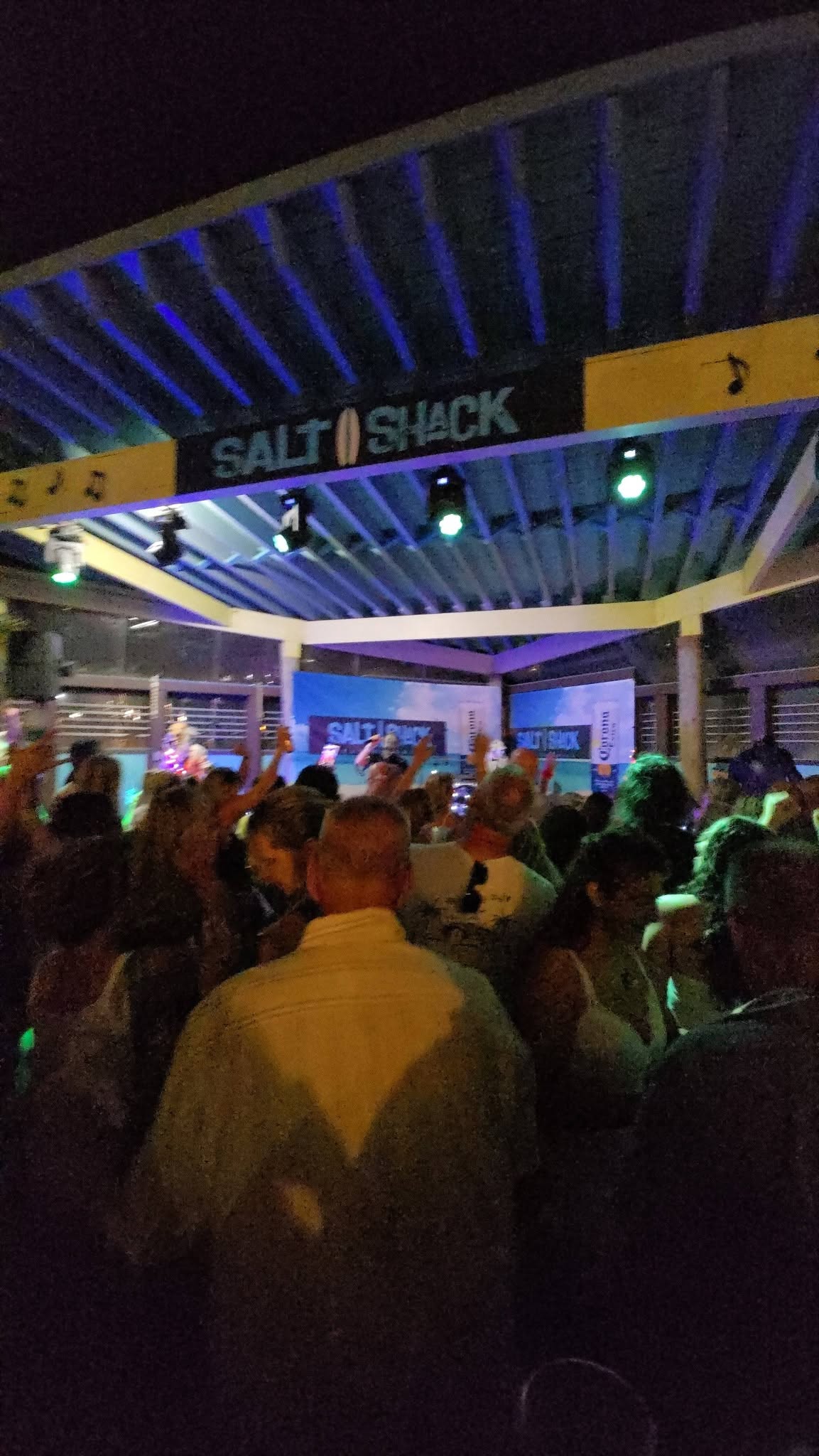 Crowd and colored stage lighting at Salt Shack